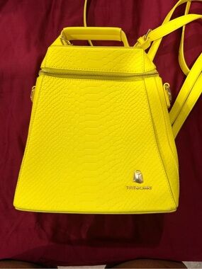 Tote & Carry Yellow Faux-Snakeskin Backpack
